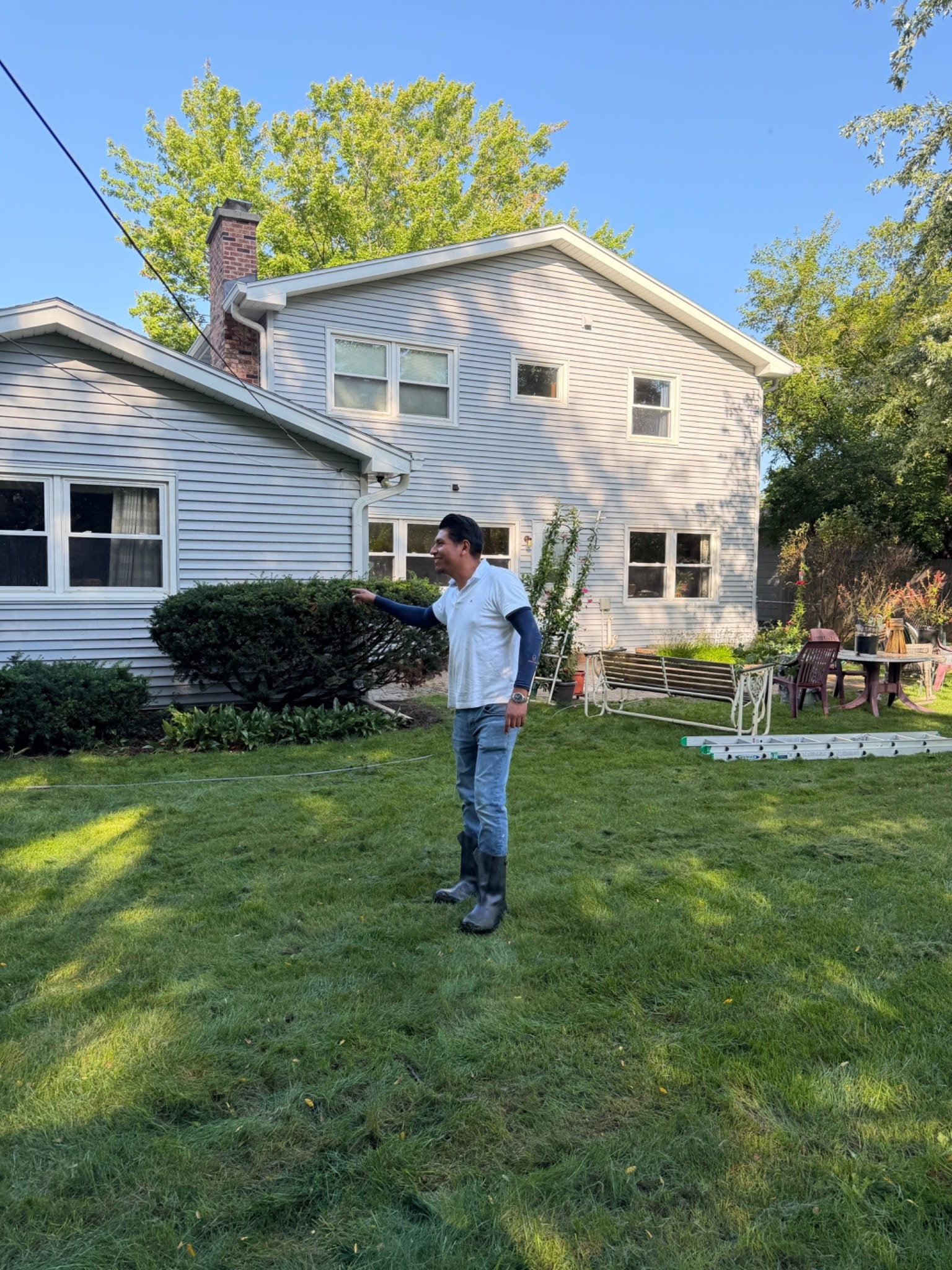 Florencio Martinez of MartGo Power Washing at a customer property in Madison, Wisconsin