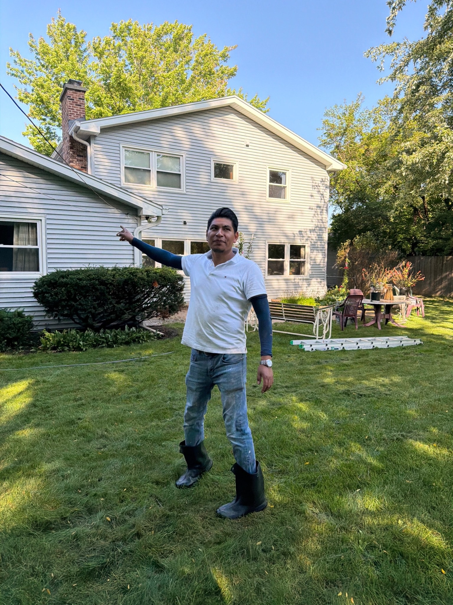 Florencio Martinez, owner of MartGo Power Washing, at a customer property in Madison, Wisconsin